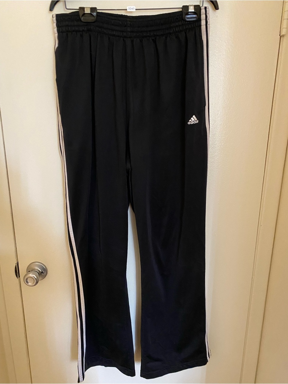 Adidas women’s Black Track Pants with White Side Stripes